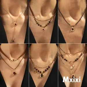 [Mxixi] Kalung set desain stackable berwarna emas berhias batu mata harimau dengan detail bintang terdiri dari berbagai gaya rantai seperti rantai tipis dan rantai manik X407