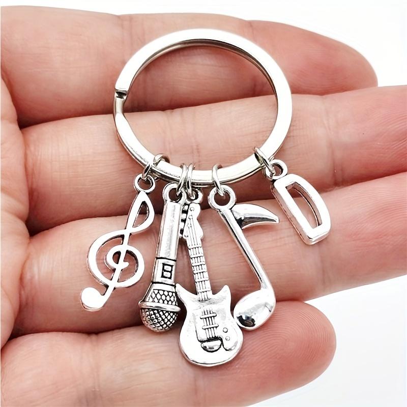 Product Introduction of 1 Piece Creative Fashion A-Z Letter Music Keychain, with Musical Notes, Microphone, and Guitar Pendant - Creative Jewelry - Ideal Decoration for Your Keys and Bags! 3