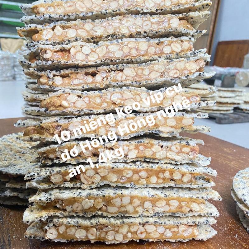 Combo 10 miếng kẹo cắt đôi cu đơ Hồng Hồng nghệ an 1,3kg -1,4kg siêu ngon rẻ. Trong dẻo ,ngoài bánh đa giòn, lạc dòn béo bùi Food