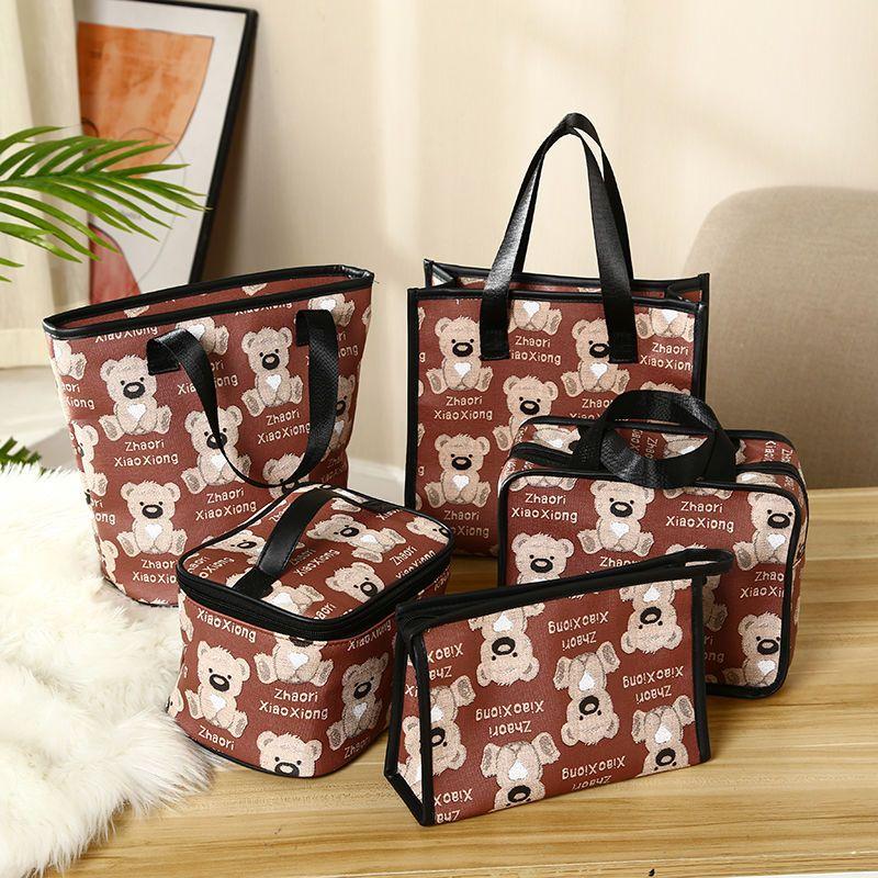 Product Introduction of New Cosmetic Bag Portable Large Capacity Waterproof Cosmetics Storage Bag Travel Handbag Cartoon Wash Bag 4