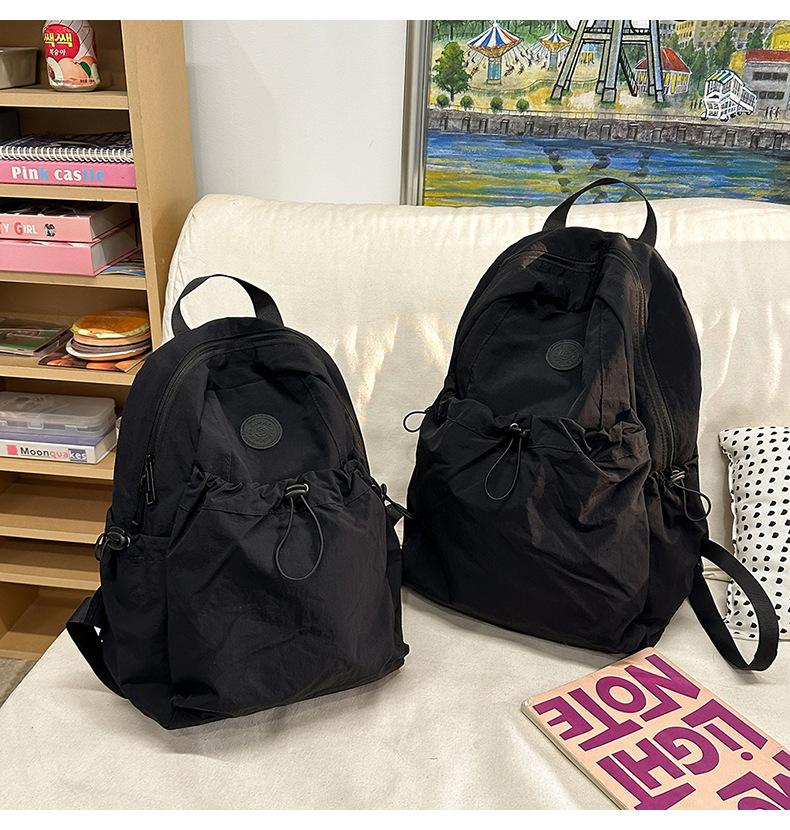 Product Introduction of Backpack, Student Schoolbag, Outdoor Backpack Leisure Simple and Lightweight Early High School Student Schoolbag New Drawstring All-Match Travel Backpack 12