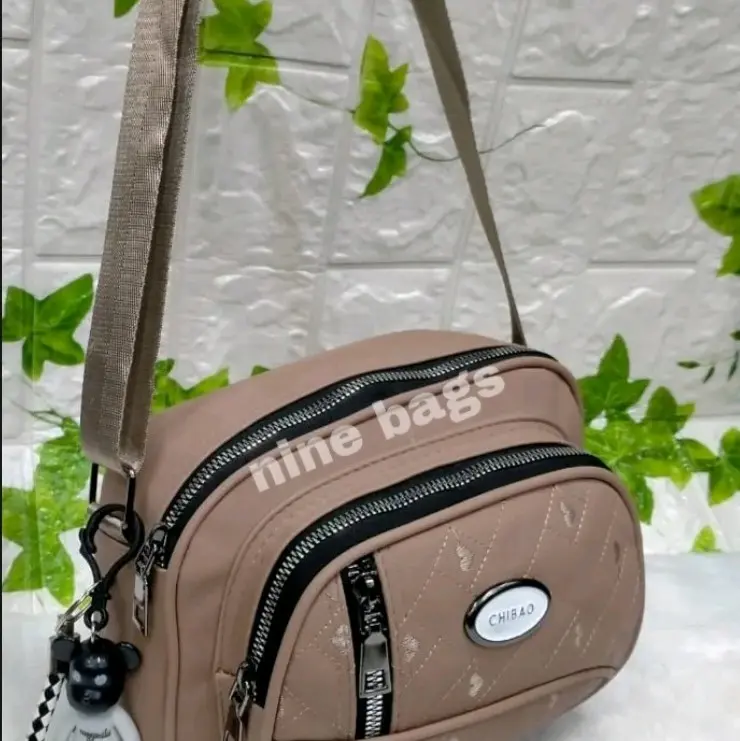 tas selempang wanita  rotan lengkung