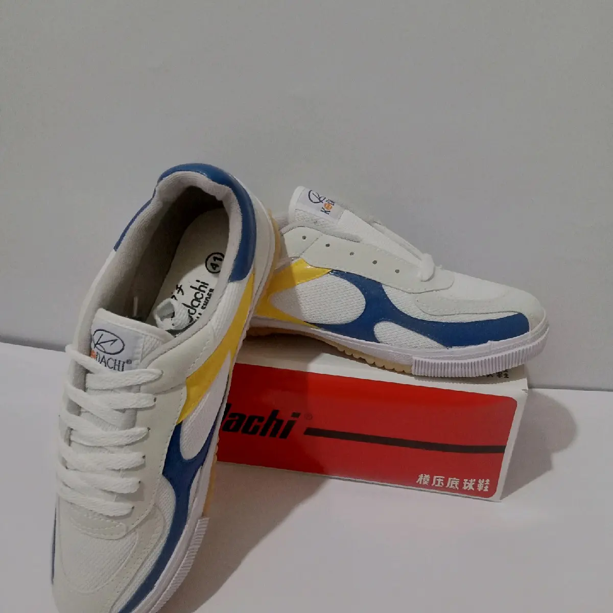sepatu capung KODACHI 8118 kuning biru retro klasik Sneakers pria