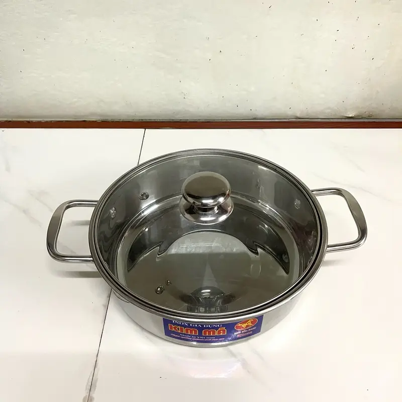 Lẩu size 22 có tặng vá lẩu , nắp kính  cường  lực inox 430 đáy bằng Kim mã 6