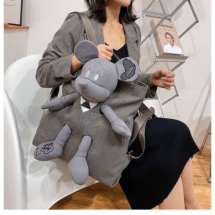 Product Introduction of Ba Lô Vải Bố Búp Bê Mickey, Thời Trang, Phong Cách Phương Tây Thường Ngày Sức Chứa Lớn, Thích Hợp Đi Du Lịch, Túi Đi Học Học Sinh, Hàng Mới Về Năm 2024 Nam Bag Backpack Đeo Vai 18