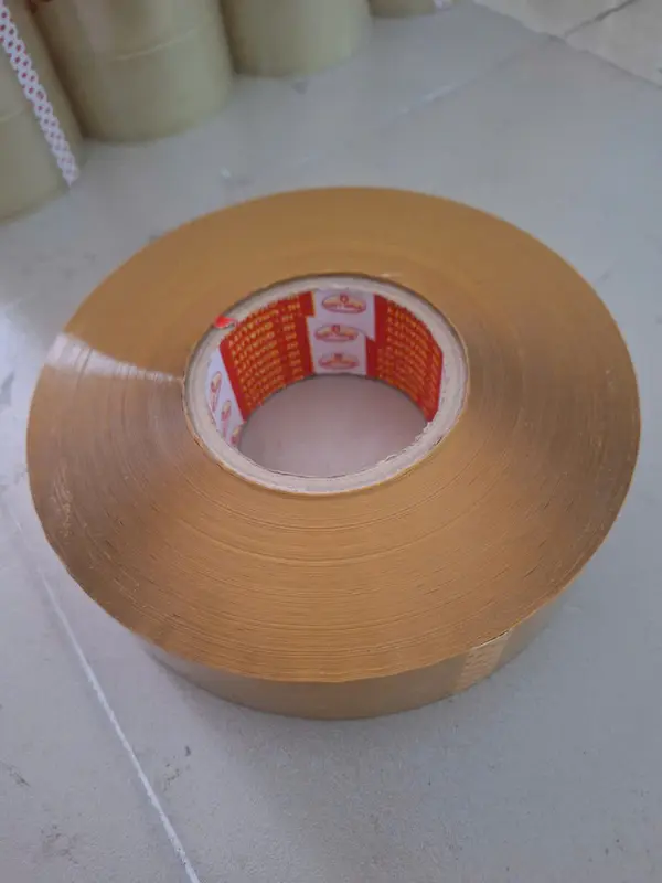 Băng keo ĐỤC siêu dính loai  1 kg/ cuộn  trong ( 1 cuộn= 1kg), chuyên dán thùng hàng nặng, thùng hàng xuất khẩu 0