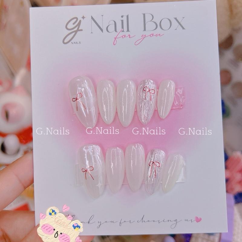 Nail tráng gương trắng gạo nơ ánh kim