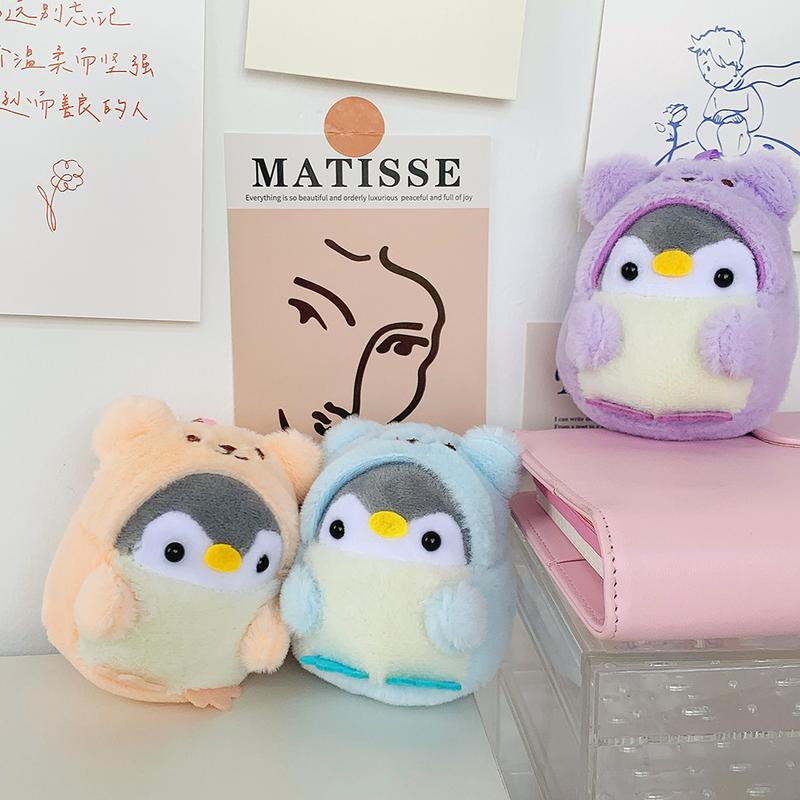Product Introduction of New Cute Plush Toy Bear Transforms into Penguin Backpack Doll Plush Pendant Grab Machine Doll Wholesale 2