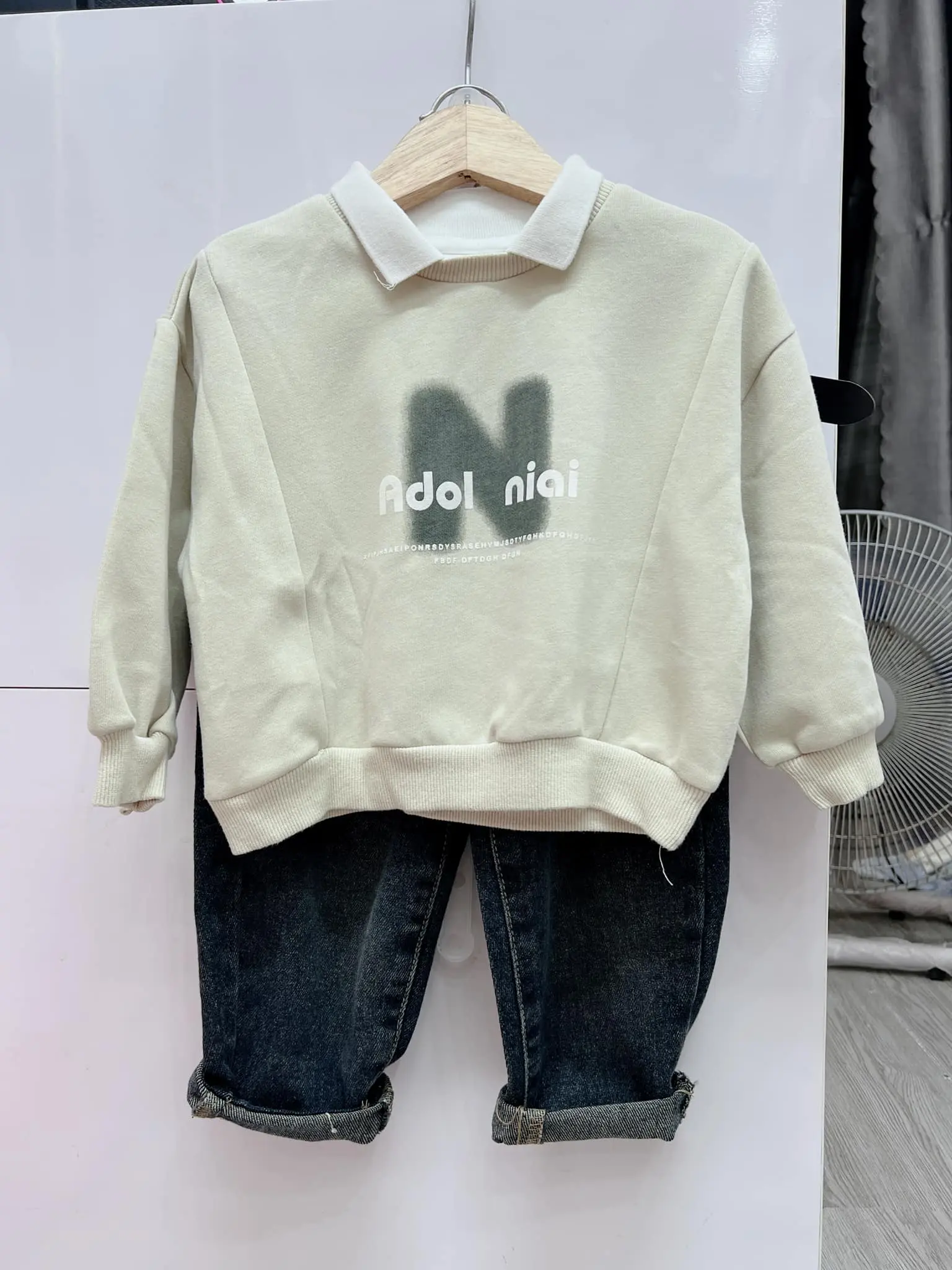 Áo  nỉ nam xanh mint cổ bẻ trắng