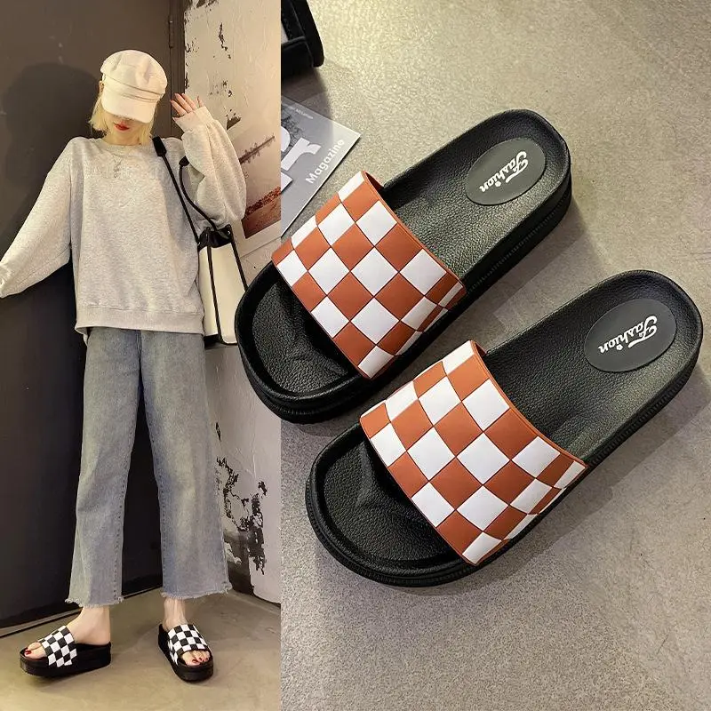 Thick-soled couples wear stylish slippers over the top
