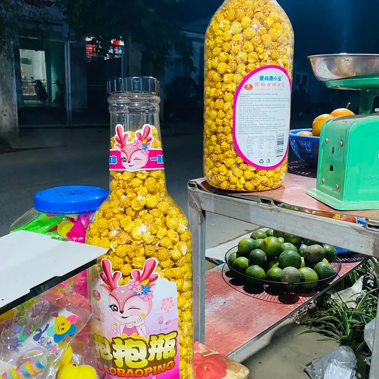 Bỏng ngô hươi bé chai to (890g ngô) Snack Ăn Vặt