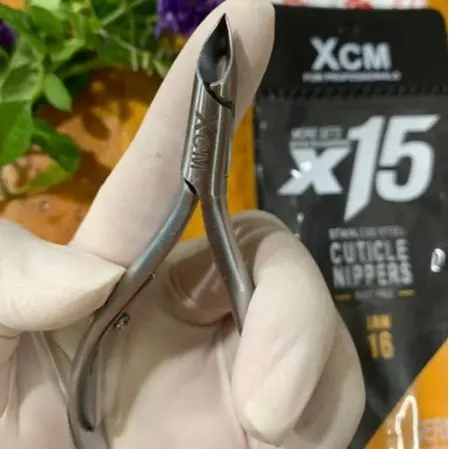 Kềm máng tròn nhặt da XCM