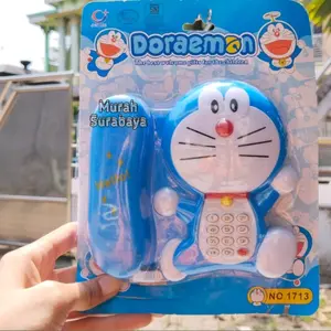 Mainan Teleponan Anak Anak Adaa Bunyi Suara Dan Lampu 1713D | Mainan Anak Murah Meriah Menggunakan Baterai Mainan Anak Telepone Karakter Doraemon Suara Musik | Telepone Music Doraemon Kemasan Karton / Kertas Mainan Edukasi Anak Toys