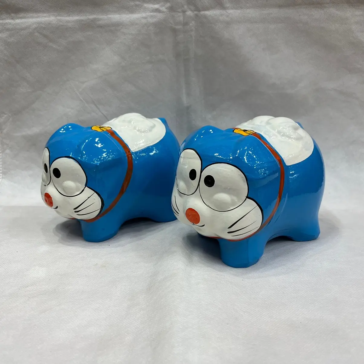 Heo Đất Tiết kiệm DORAEMON MÀU XANH BIỂN Sơn Phủ Bóng Size 18cm * 13cm (hàng sơn bóng đẹp)