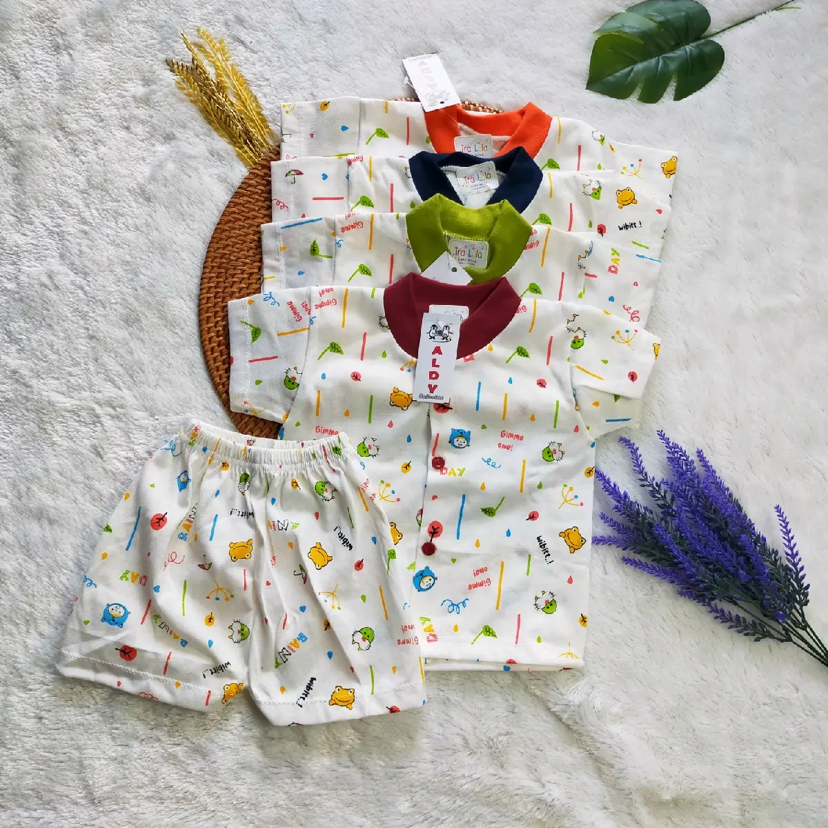 setelan bayi lengan pendek motif lucu