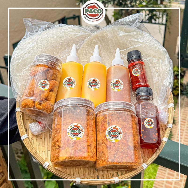 Set Bánh tráng phơi sương Paco Food 10 MÓN FULL TOPPING gồm 2 bánh tráng phơi sương 2 hủ ruốc hành phi 1 chai sốt tắc lớn 1 chai ớt rim 1 hủ tóp mỡ kèm 2 chai bơ phô mai và 1 chai muối béo-đồ ăn vặt ngon
