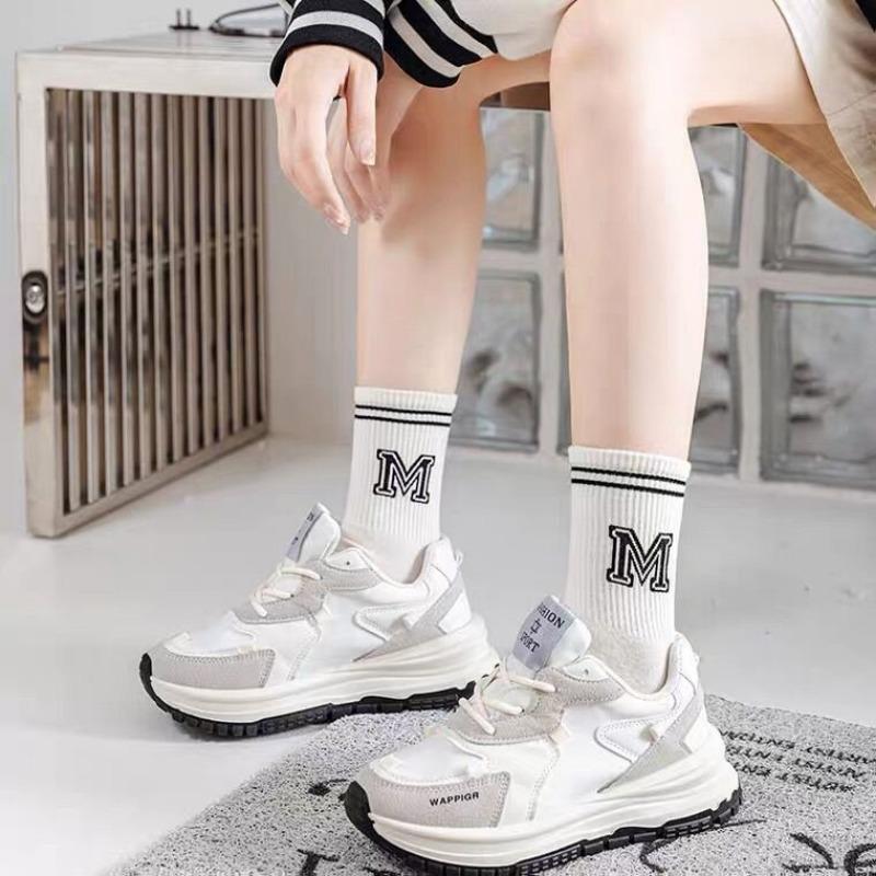Product Introduction of Simple Black And White Striped Sports Socks 6