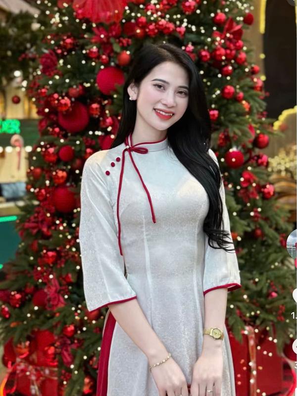 Áo dài truyền thống MINH KHUÊ chất liệu gấm cổ lệch phối nơ tay lỡ 7