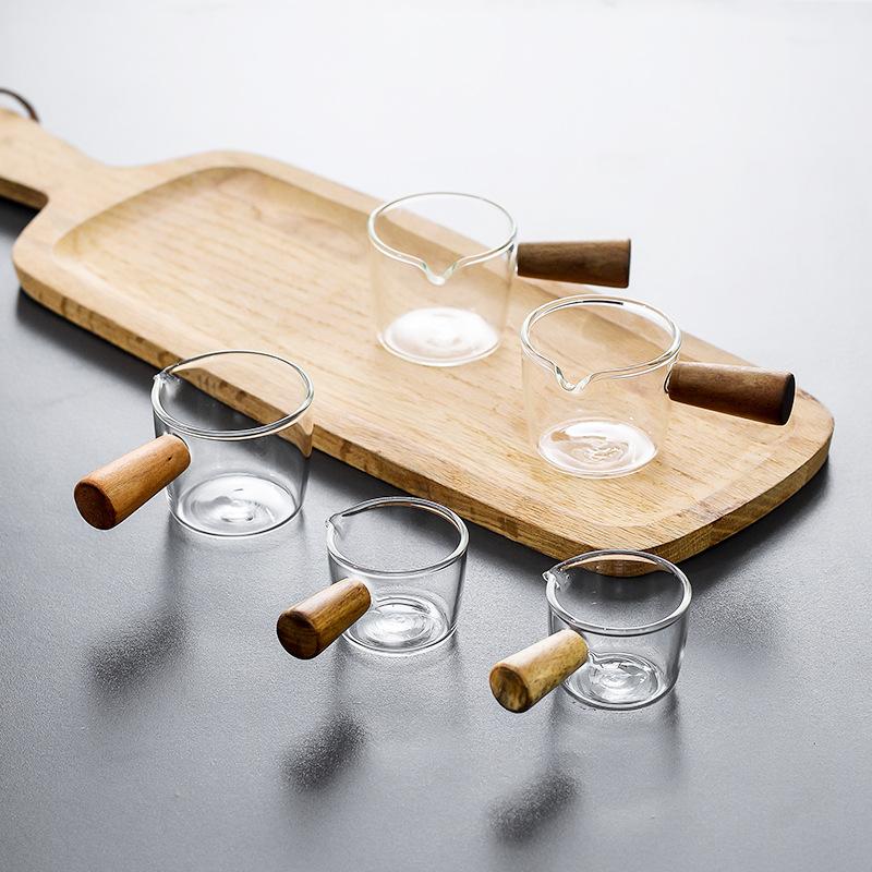 Product Introduction of 1/2pcs 100ML Double Spout Coffee Milk Glass Pot with Wood Handle Cute Measuring Frothing Pitcher Latte Cup for Barista Coffee Making 10