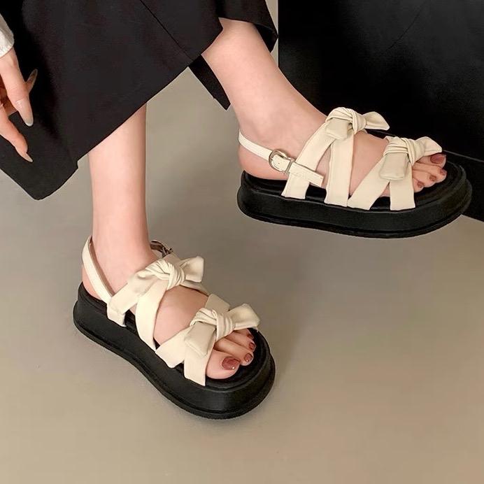 Dép quai hậu hai nơ nữ mới đế đen quai trắng