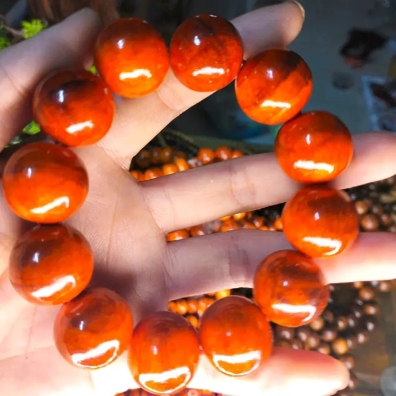 VÒNG TAY GỖ HUYẾT LONG THẤU QUANG 1