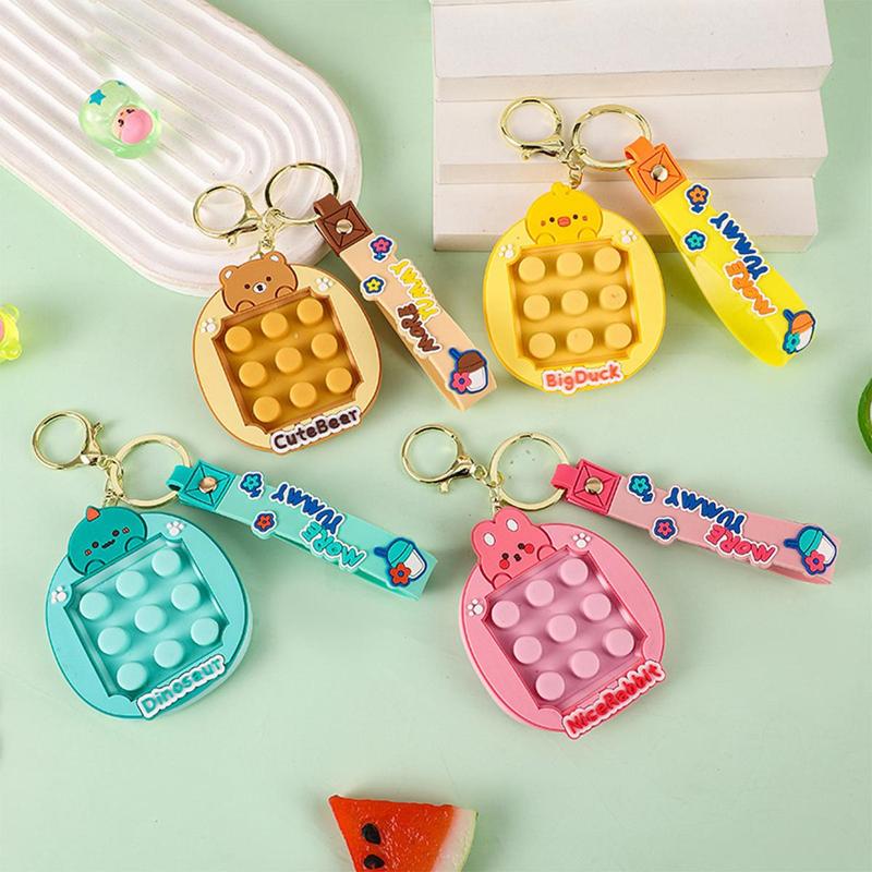 Keychain push -type popular game small to eliminate pressure on the ...