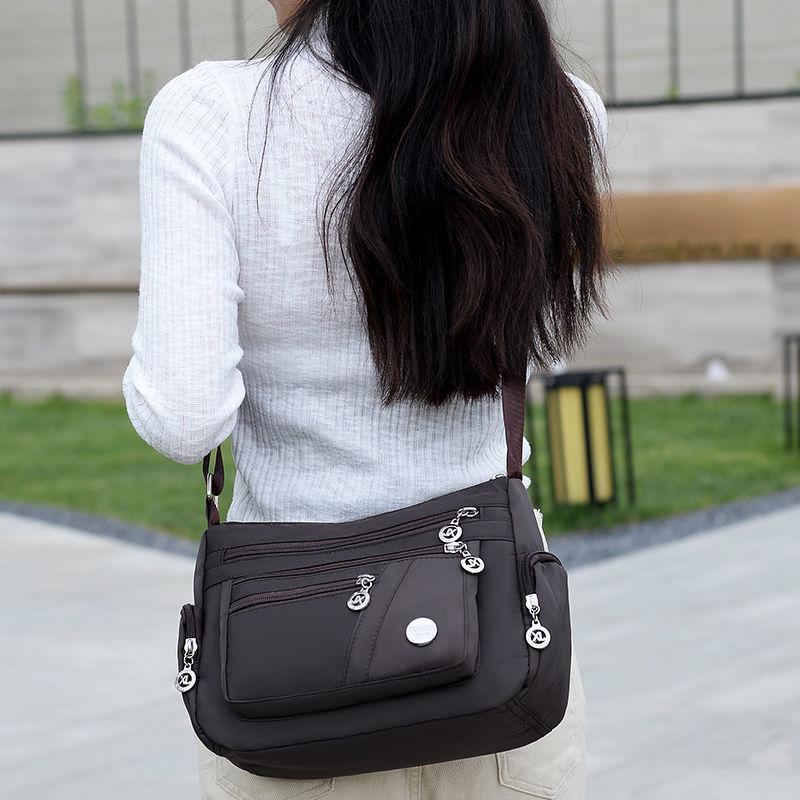 Product Introduction of Women's Bag Mother's Bag New 2025 Middle-Aged Women's Bag Nylon Canvas Bag Waterproof Multi-Layer Shoulder Messenger Bag 22
