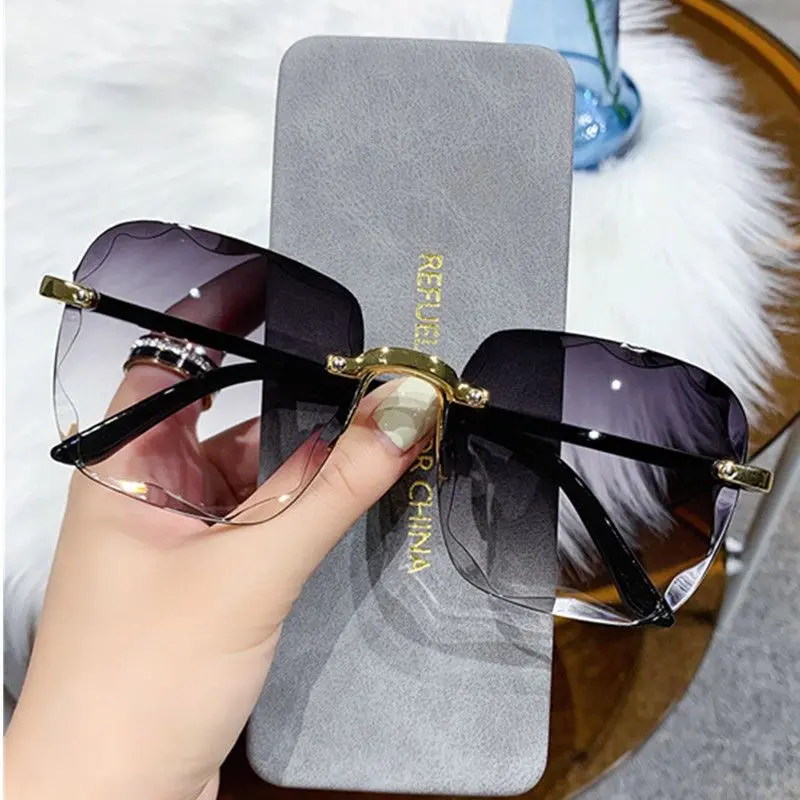 Kacamata Hitam Wanita Fashion Gaya Tanpa Bingkai Eyewear Sunglasses