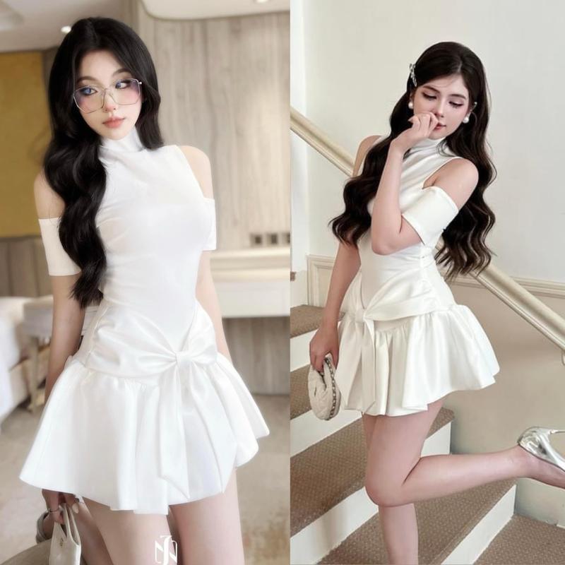 Đầm dự tiệc đám cưới cổ cao hở vai thắt nơ xòe màu trắng và màu đen (chất thun phối taffta) sang chảnh