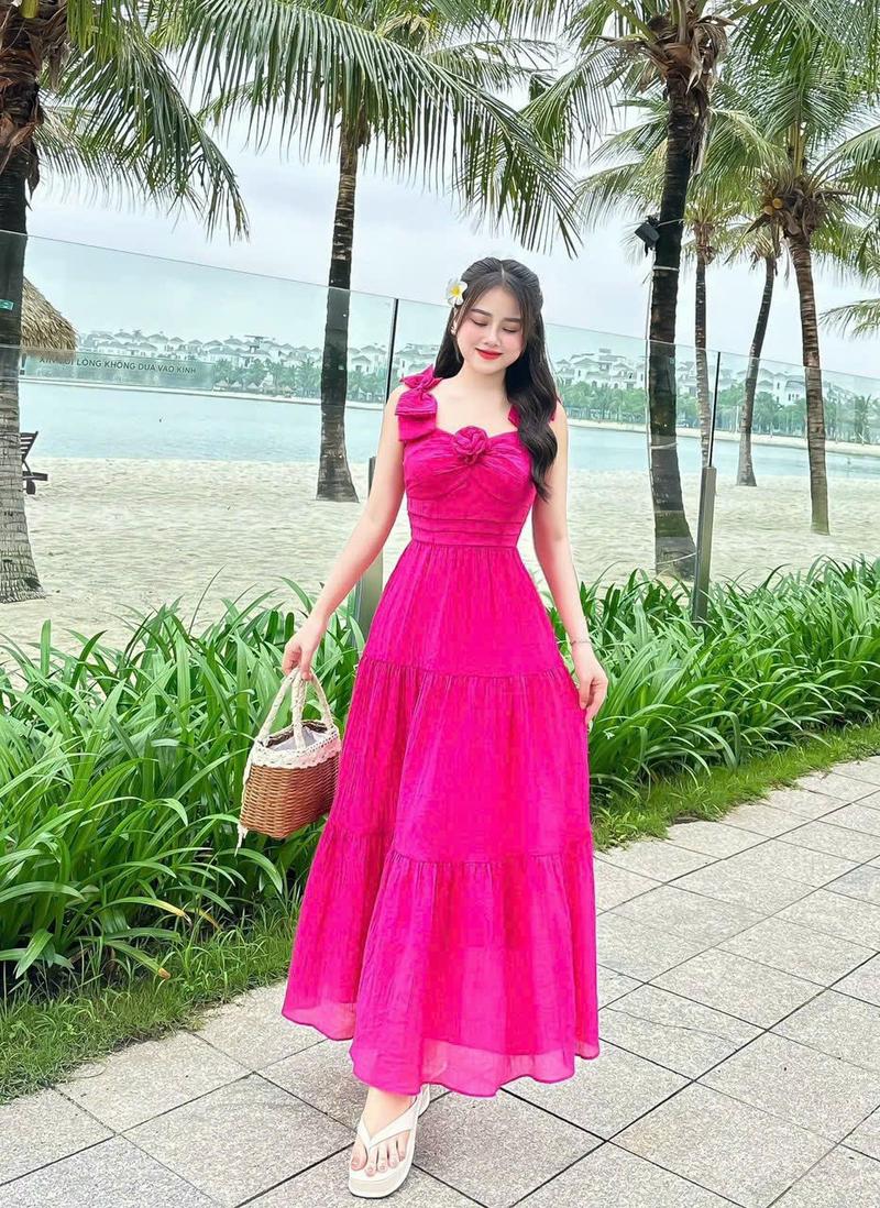 Product Introduction of Đầm maxi thời trang nữ mặc đi biển chất tăm gãy vai nơ ngực gắn bông váy dài xòe maxi có lót trong có 5 màu như hình qc Màu Hồng 6