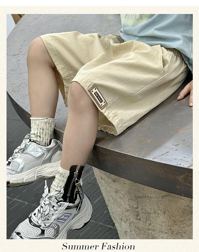 Product Introduction of Summer minimalist thin children's shorts for boys and girls, children's clothing for boys and girls, solid color cotton pants for boys 4