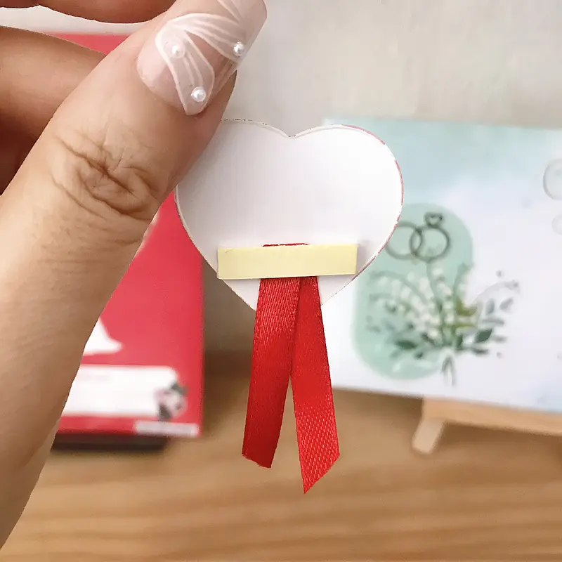 Bọc trái tim nơ dán cho khách đến dự đám cưới - mẫu 01 1