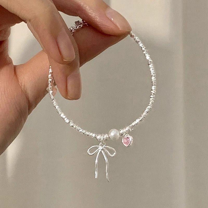 Product Introduction of S925 Loving Heart in Sterling Silver Zircon Bow Small Pieces of Silver Necklace Bracelet Set Ins Niche Temperament Clavicle Chain 1