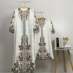 Asaya Gaun elegan dengan motif posisi mode lengan panjang