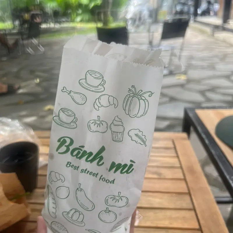 1.500 Túi đựng bánh mì trắng in xanh S1- kích thước 95x50x245 giấy  gói 3