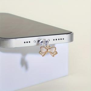 Enchufe contra polvo con diseño de lindo moño, 1 unidad protector de puerto de carga a la moda, partes para celular para iPhone y Tipo-C, accesorios para teléfonos