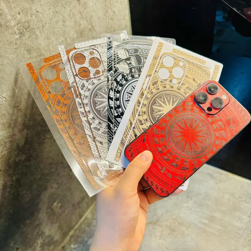 Miếng dán skin da mỏng các màu- Skin da trống đồng các máy và iphone 5/5s đến 16promax Dán full lưng , có viền (TDD) 0