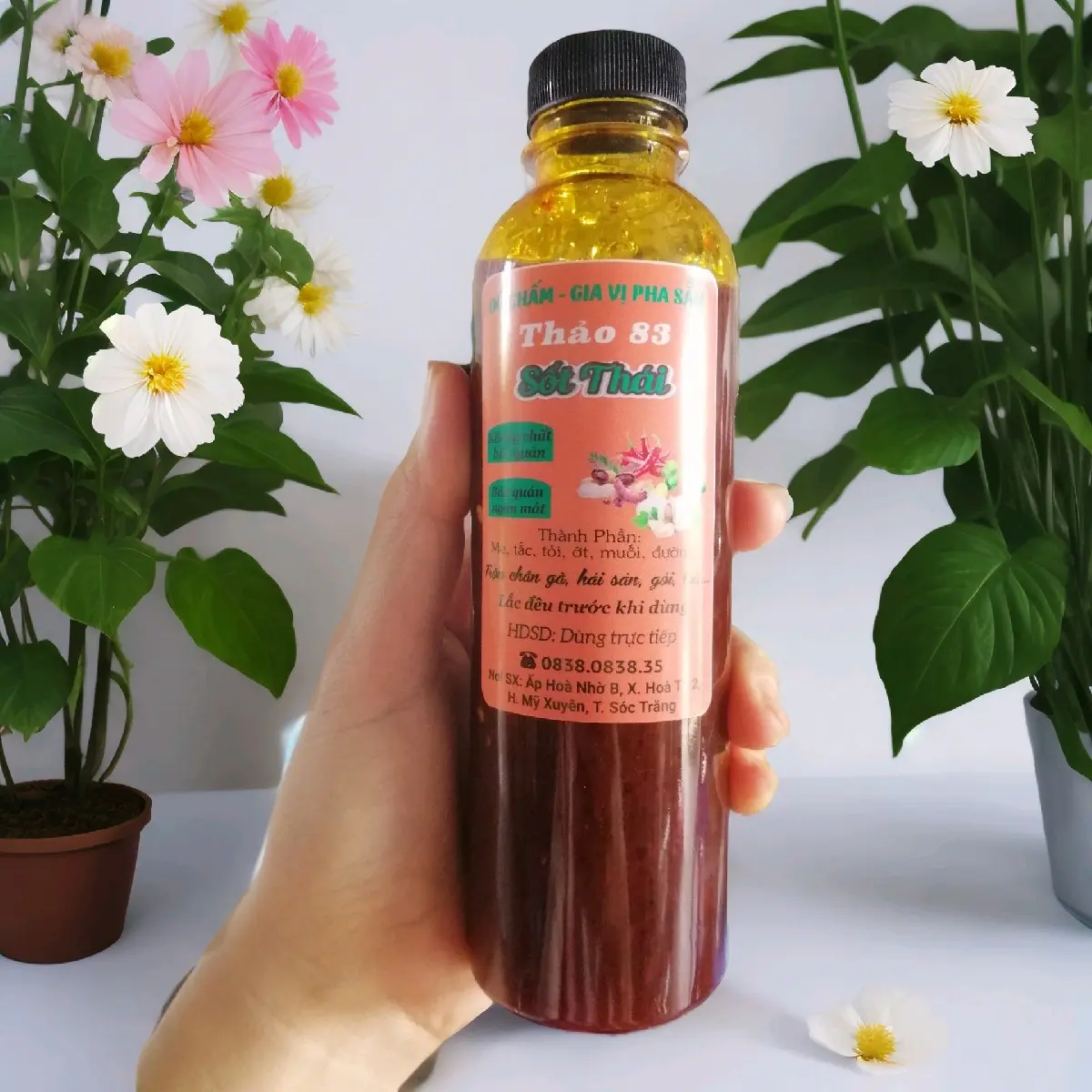 THẢO 83: Một chai nước SỐT THÁI trộn chân gà, tai heo, trứng non, hải sản, gỏi.