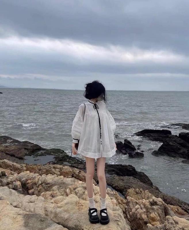 M662 - Set áo babydoll trắng xếp ly cột nơ đen kèm quần short trắng Top Nữ