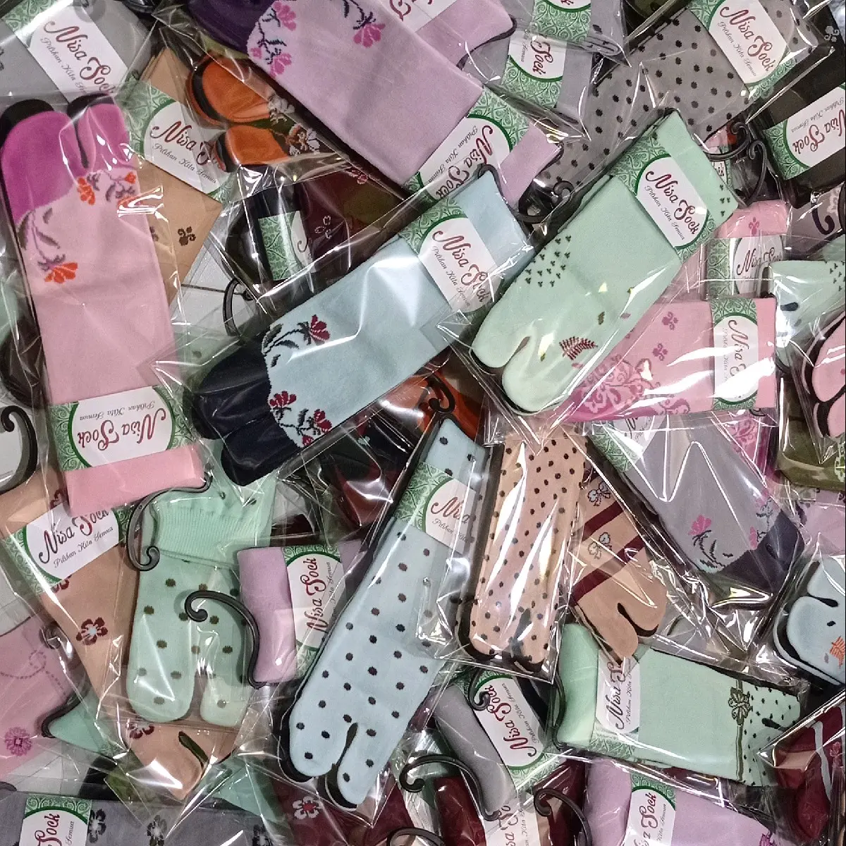 paket usaha 30 pasang dan 20 pasang kaos kaki jempol motif campur