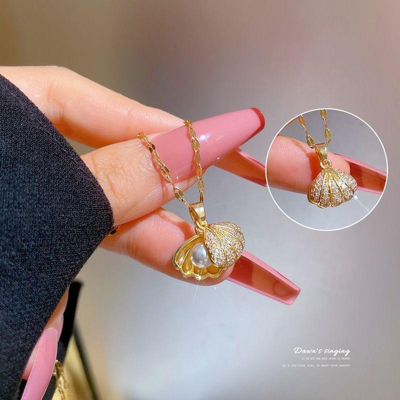 Product Introduction of Fashion Pearl Shell Necklace for Women Titanium Steel Non-Fading Gold Shell Pendant Simple Elegant Clavicle Chain trinkets butterfly  design  pendant  habib limbal  ring sardonyx chain  heart  necklace pendant  butterfly tyla  water  necklace starry  jewe 2