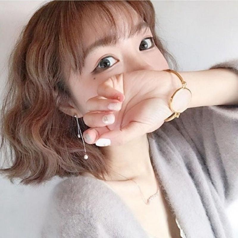 Product Introduction of Wig Women's Short Hair Short Curly Hair Wool Roll Air Bangs Fluffy Natural Face Repair Fashionable Breathable Realistic Full Head Cover 9