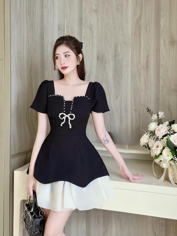 Váy thiết kế đen nơ ngực phối voan tơ sang chảnh phù hợp đi làm đi chơi