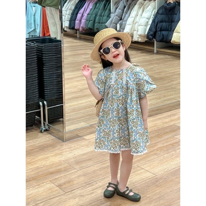 Váy hoa nhí xanh phối viền tua rua cho bé gái