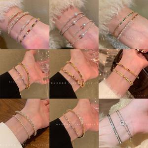 カラフルなドーパミンジルコンブレスレット女性のためのデザインツイストツイスト絶妙なブレスレットフルダイヤモンド2重いいね合わせみ重いねみ重ねブレスレットトレンディ 2026