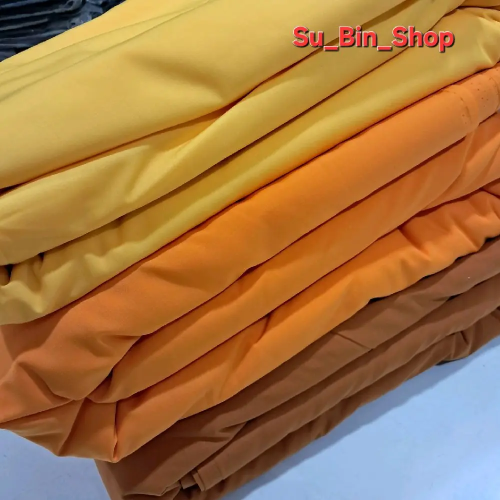Vải Kate Silk màu vàng chùa dùng may đồ ni cô, sư thầy, khổ vải rộng 1.2m