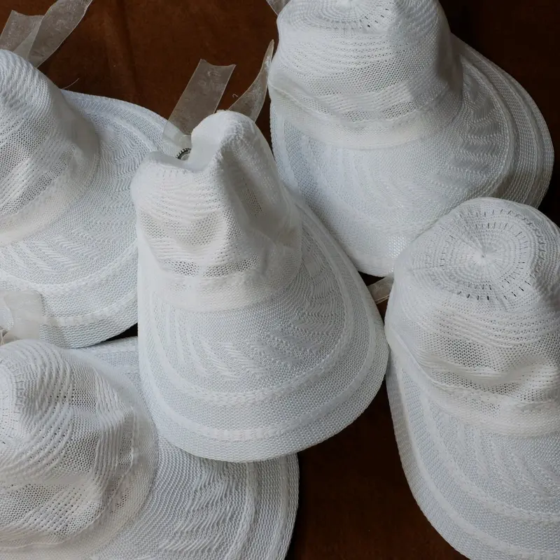 Topi Rajut putih cady golf style untuk haji dan umroh 7