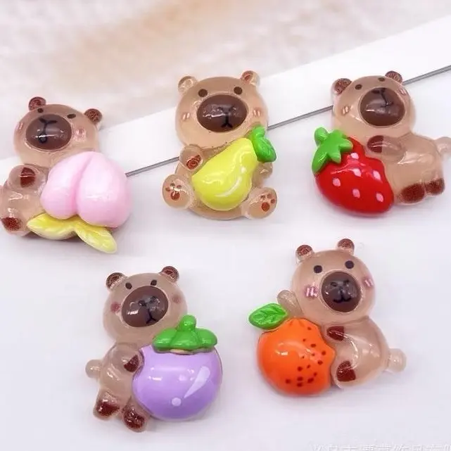 Combo charm Capybara ôm trái cây Kawaii, có túi mù tự xé trang trí 1
