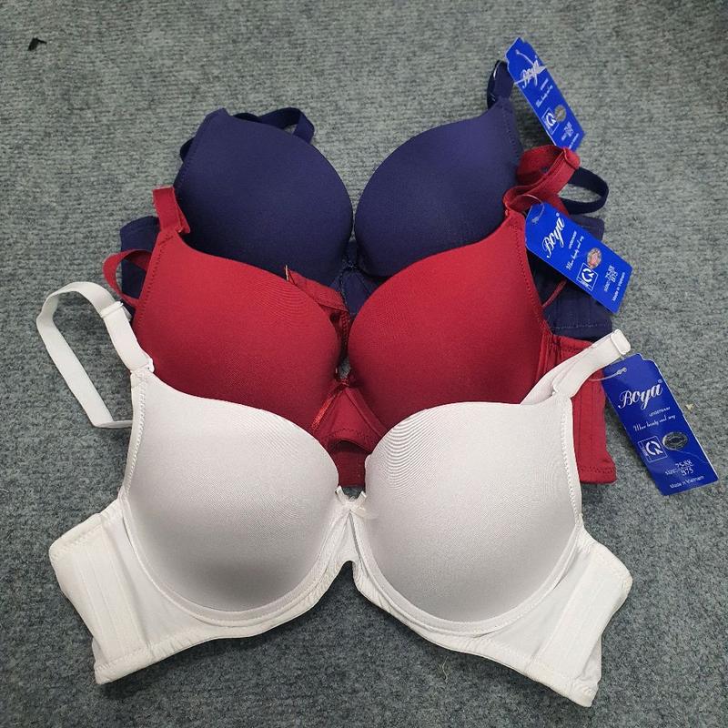 Áo Boya trơn (mã BY 062 ). mút nâng 3cm,có gọng,bản lưng vừa, 3 móc cài sau. 1