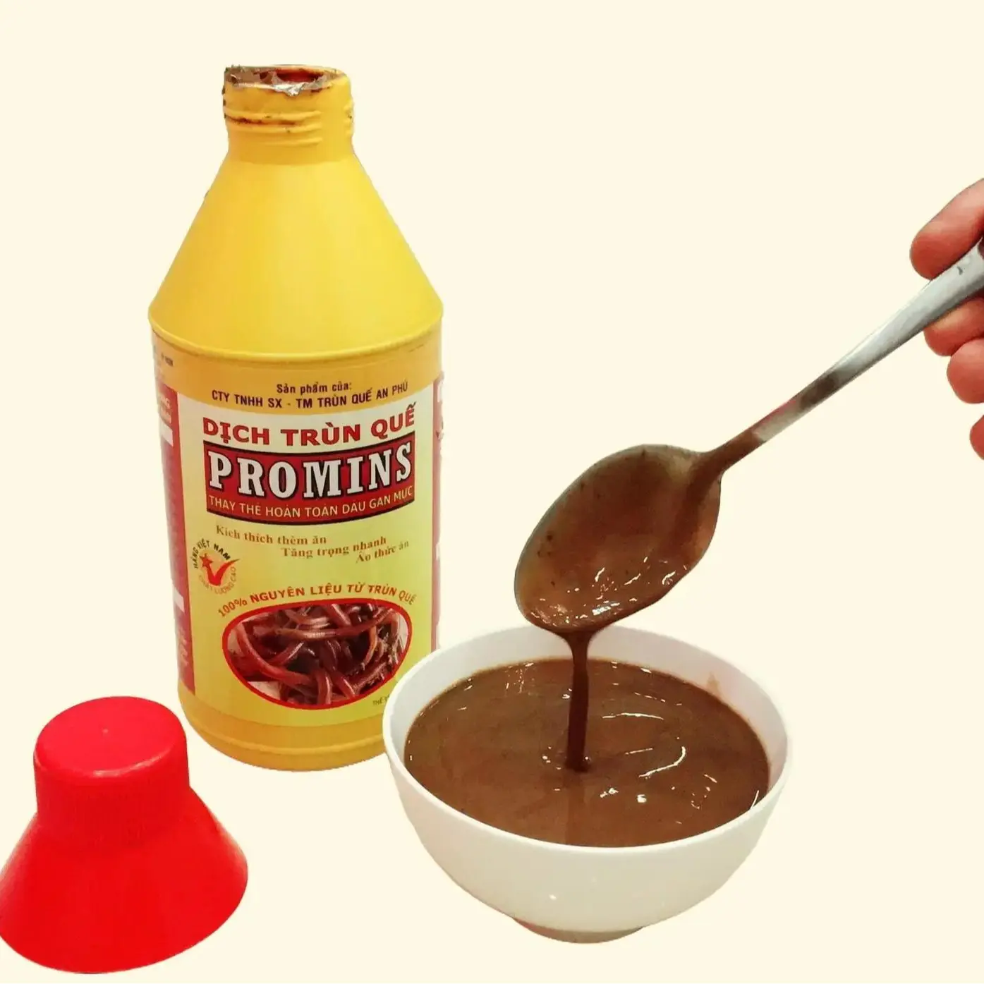 Dịch trùn quế Promins dùng cho nuôi cá tra - Chai 1 lit